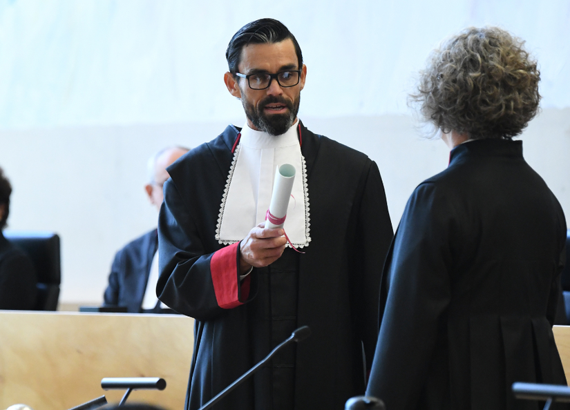 Wurranga man Lincoln Crowlely being sworn in as Australia's first ever Aboriginal Supreme Court judge.