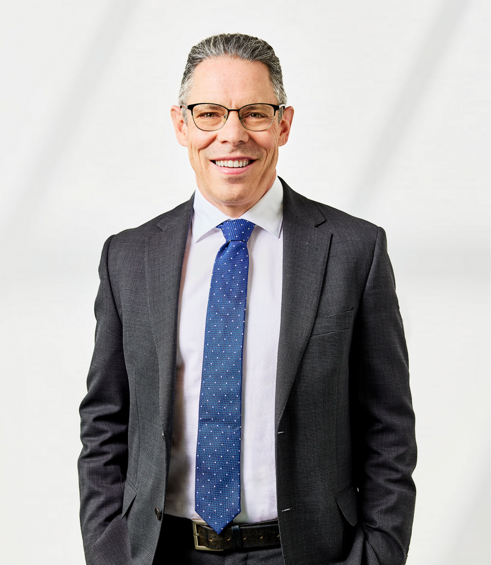 A headshot of Tom Dachs Principal at DMAW Lawyers