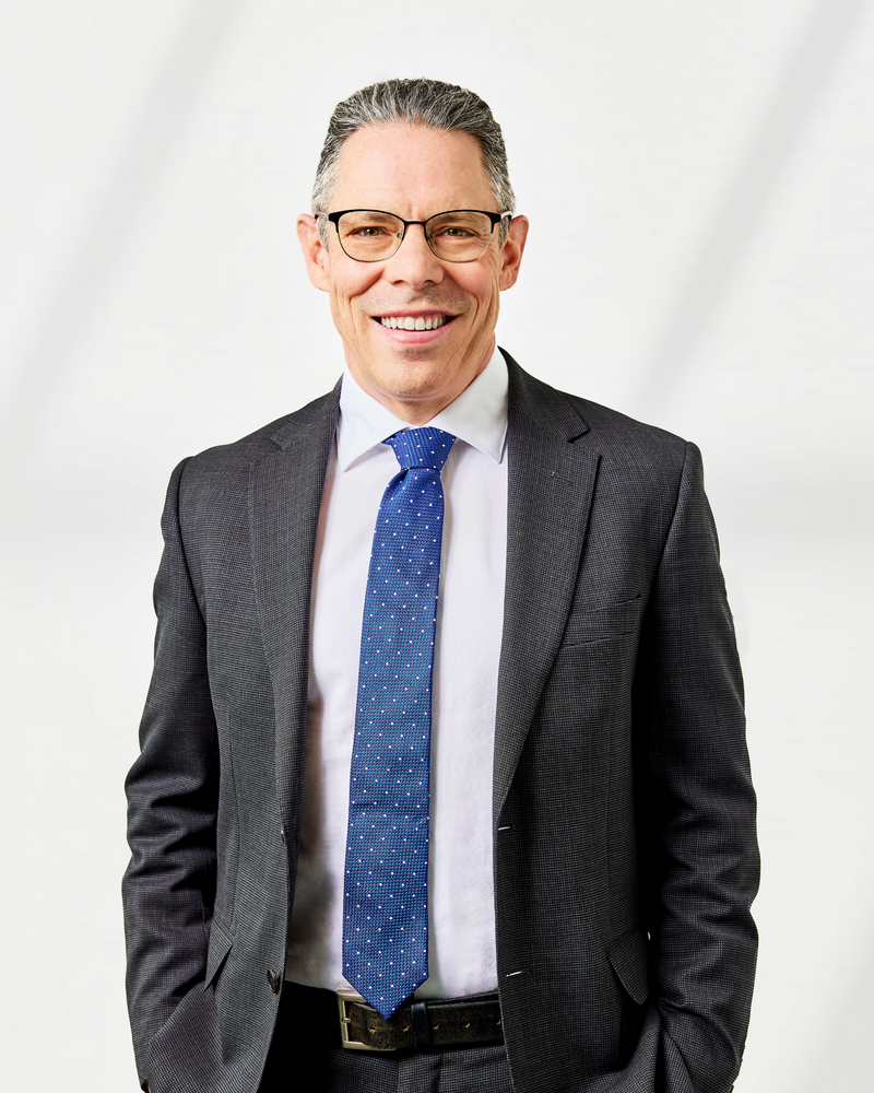 A headshot of Tom Dachs Principal at DMAW Lawyers