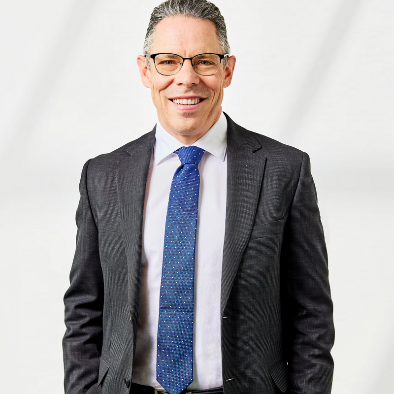 A headshot of Tom Dachs Principal at DMAW Lawyers