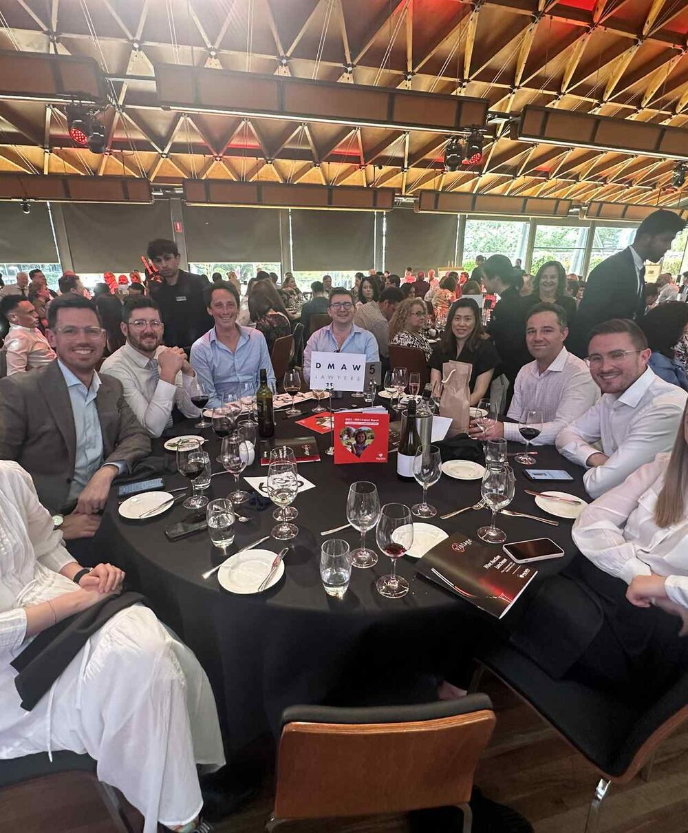 Group of lawyers and property industry professionals seated at a roundtable