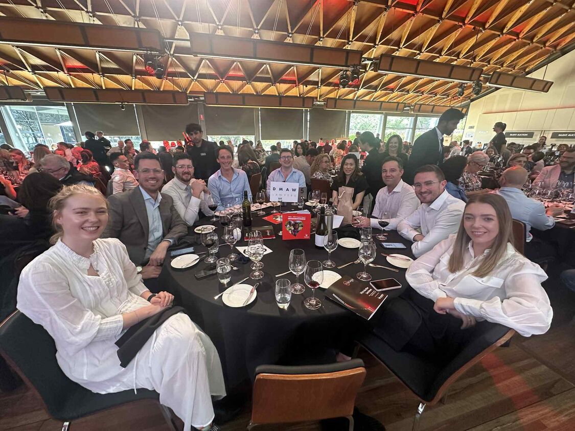 Group of lawyers and property industry professionals seated at a roundtable