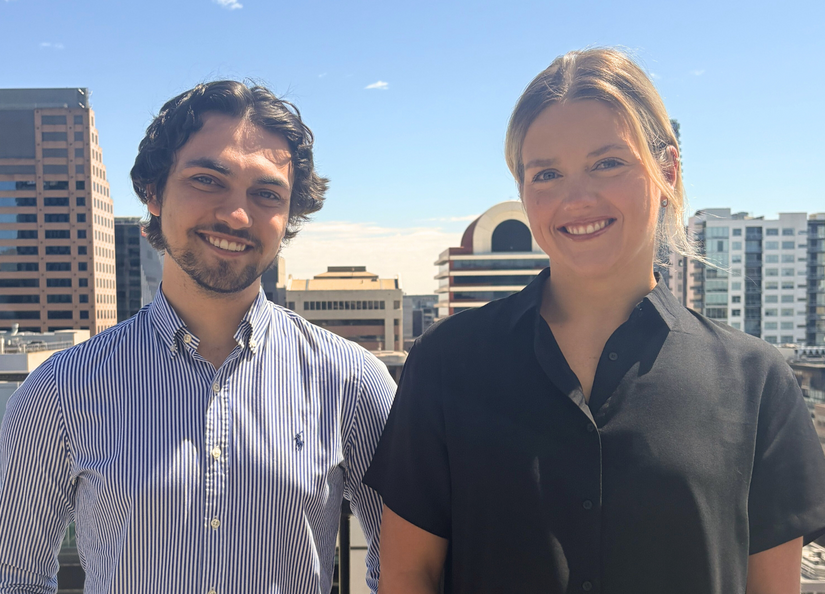 a man and a women smiling at camera