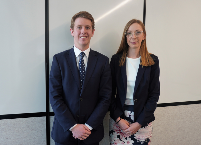 Two young prospective lawyers posing for a photo together.