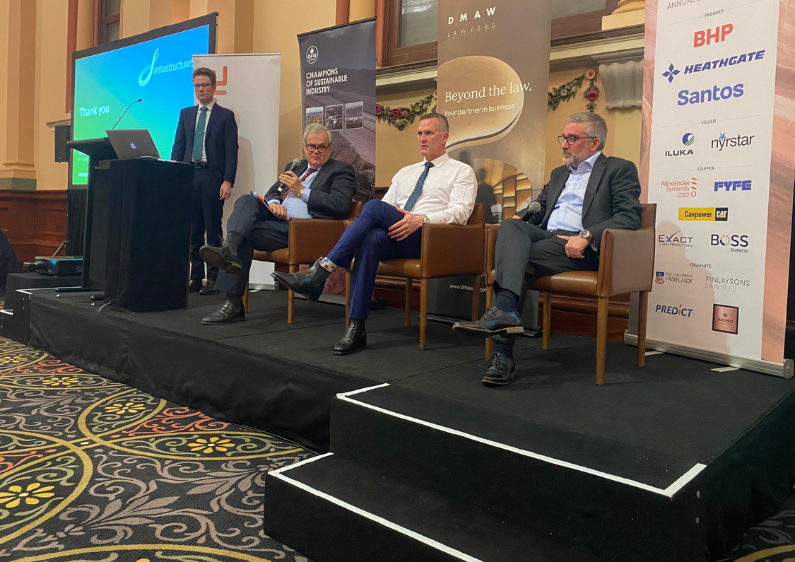Host of the SACOME event on stage with Chief Executives Dr. Paul Heithersay, Mr Jon Whelan and Mr Jeremy Conway